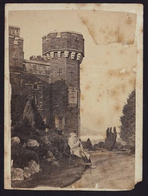 Photographer unknown :Photograph of castle and unidentified man