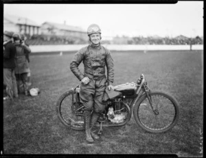 Roberts, speedway rider, on Harley-Davidson motorcycle, at Kilbirnie stadium, Wellington