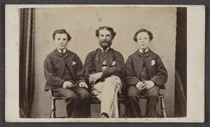 Photographer unknown :Portrait of three unidentified men