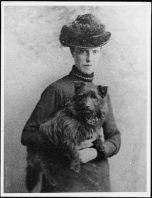 Portrait of Grace Neill holding a dog