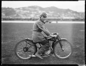 Castle, speedway rider, on Rudge motorcycle, at Kilbirnie stadium, Wellington