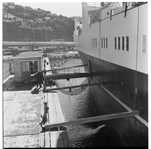 The ship Maori in the Wellington Jubilee Floating Dock, and inside the engine room of the dry dock