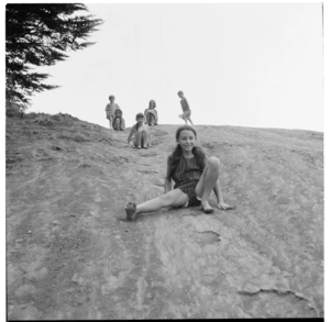 Hamilton, children sliding down a steep hill, 1971.