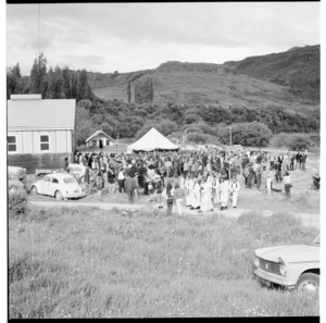 Tangi for James K. Baxter, and funeral procession going up the hill to the graveside next to 'the Big House', Jerusalem, Whanganui