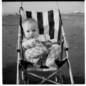 Closeup views of an unidentified baby, and, Waikanae Beach, 1973.