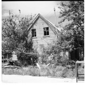 Derelict buildings and cars, 1974.