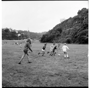 Team of children with a soccer ball on Appleton Park, Karori, Wellington