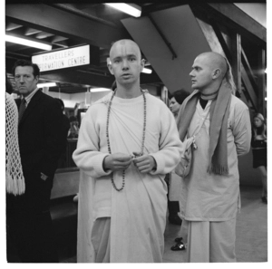 Hare Krishnas welcome a visiting monk, Auckland International Airport