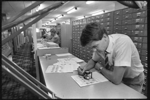 Fingerprint technician Harry Webbink at work