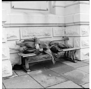 Homeless man lying on a seat outside the Town Hall, and, anti-abortion protest on Abortion Action Day