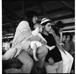 Women selling raffle tickets, and, a Māori family (possibly at an A&P show)