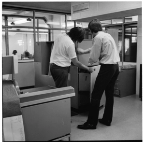 Databank computers, and, flat dwellers in Vivian Street, Wellington, 1971.