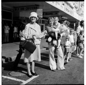 Bystanders in Wellington, possibly watching a Christmas parade