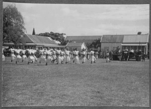A presentation by members of the Home Guard, Tonga Defence Force, 2nd NZEF, during the anniversary of the accession of King George Tubou 1 as King of Tonga
