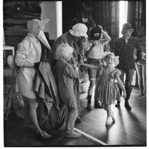 Children in costumes and a Christmas party with Father Christmas in attendance