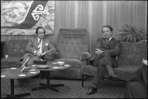 Bob Tizard and Bill Rowling, Prime Minister, possibly at a press conference in an airport lounge