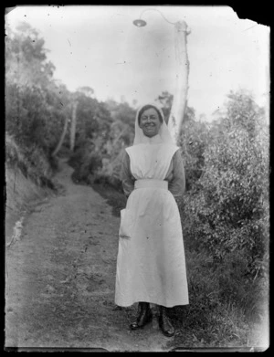 Portrait of a nurse standing on a track