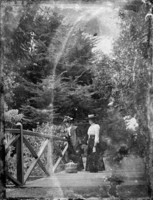 Two women on bridge, probably Botanic Garden