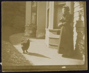 Photographer unknown :Photograph of women with hen
