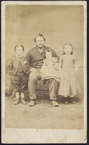 Photographer unknown :Portrait of J Jeffries with three children