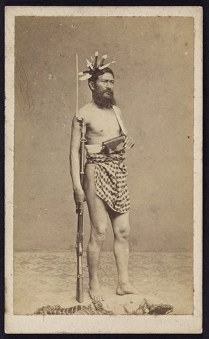 Photographer unknown :Portrait of unidentified man with rifle