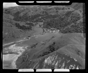 River running to Waipatiki Beach and some houses, Hastings District, Hawke's Bay