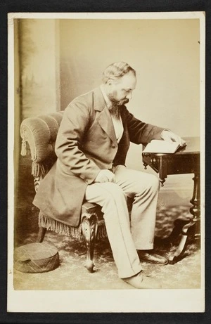 Portrait of Sir Robert Stout at desk