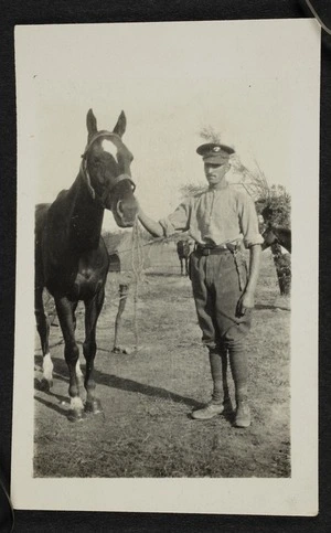 Nathaniel Arthur Pearce's horse Mic with his groom Shingles