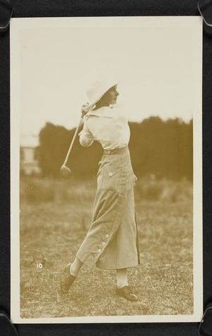 Agnes Isobel Stout with a golf club