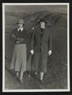 Agnes Isobel Stout and another woman walking across a field