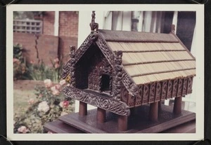 Miniature carved pataka on the porch of Agnes Isobel Stout's house