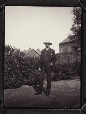 Arthur Edward Pearce standing in garden