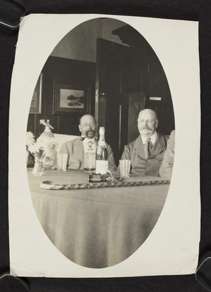 Arthur Edward Pearce at dining table