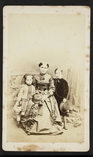 Portrait of Ms Warren with an unidentified woman and boy
