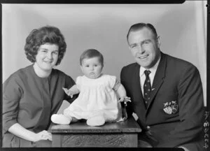 Mr D B Clarke with wife and child