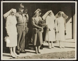 Thomas Duncan McGregor Stout with the Queen Mother and other staff outside Pinewood, England, during World War Two