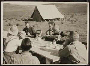 Thomas Duncan Macgregor Stout, with other men, at breakfast, Pharsala, Greece, during World War Two