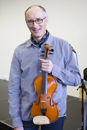 Digital photographs of Chris Prosser performing 'Drink Violin'