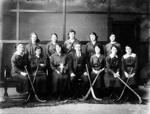 Group portrait of the Stratford District High School girls' hockey team