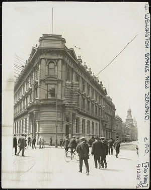 Creator unknown :Photograph of Bank of New Zealand building and pedestrians, corner of Lambton Quay and Customhouse Quay, Wellington