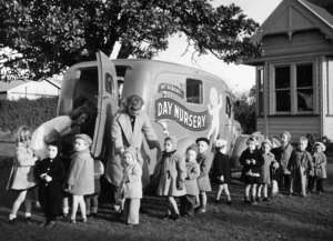 Staff of the Mt Albert Day Nursery guiding children into the Nursery vehicle