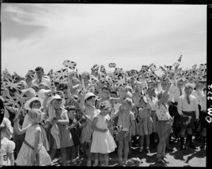 Children waving Union Jack flags during visit of Queen Mother to Blenheim - Photograph taken by Mr W Walker