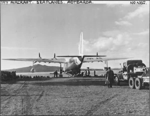 The seaplane Aotearoa being hauled onto the grass at Mission Bay, Auckland