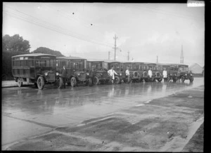Row of Passenger Transport Company buses and drivers, Otahuhu