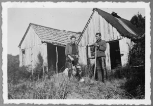 Gold miners Don Harvey and Harry outside house at Blue Spur, Central Otago