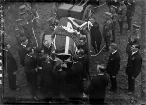 Casket being transported on a gun carriage, state funeral of Prime Minister William Ferguson Massey, Wellington
