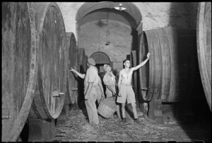 New Zealand soldiers with wine casks in a cellar, near San Casciano, Italy - Photograph taken by George Frederick Kaye