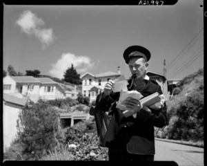 Postman on his round in a Wellington suburb - Photograph taken by W Wilson