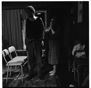 Photographs showing actors rehearsing 'The Devil and Mr Mulcahy' play, watched by Phillip Mann