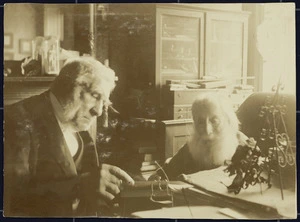 Photograph of gentlemen seated at table